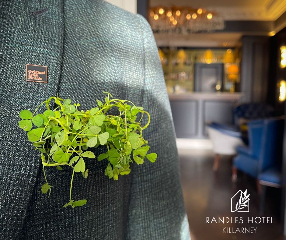 Close up of Shamrocks in the pocket of a Randles Hotel Killarney Employee